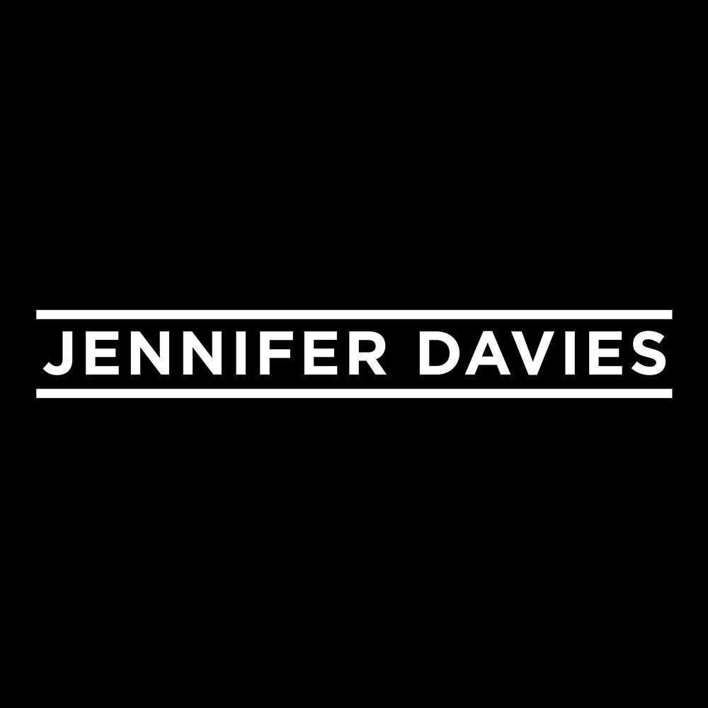 White Jennifer Davies lettering framed by two horizontal rules on black.