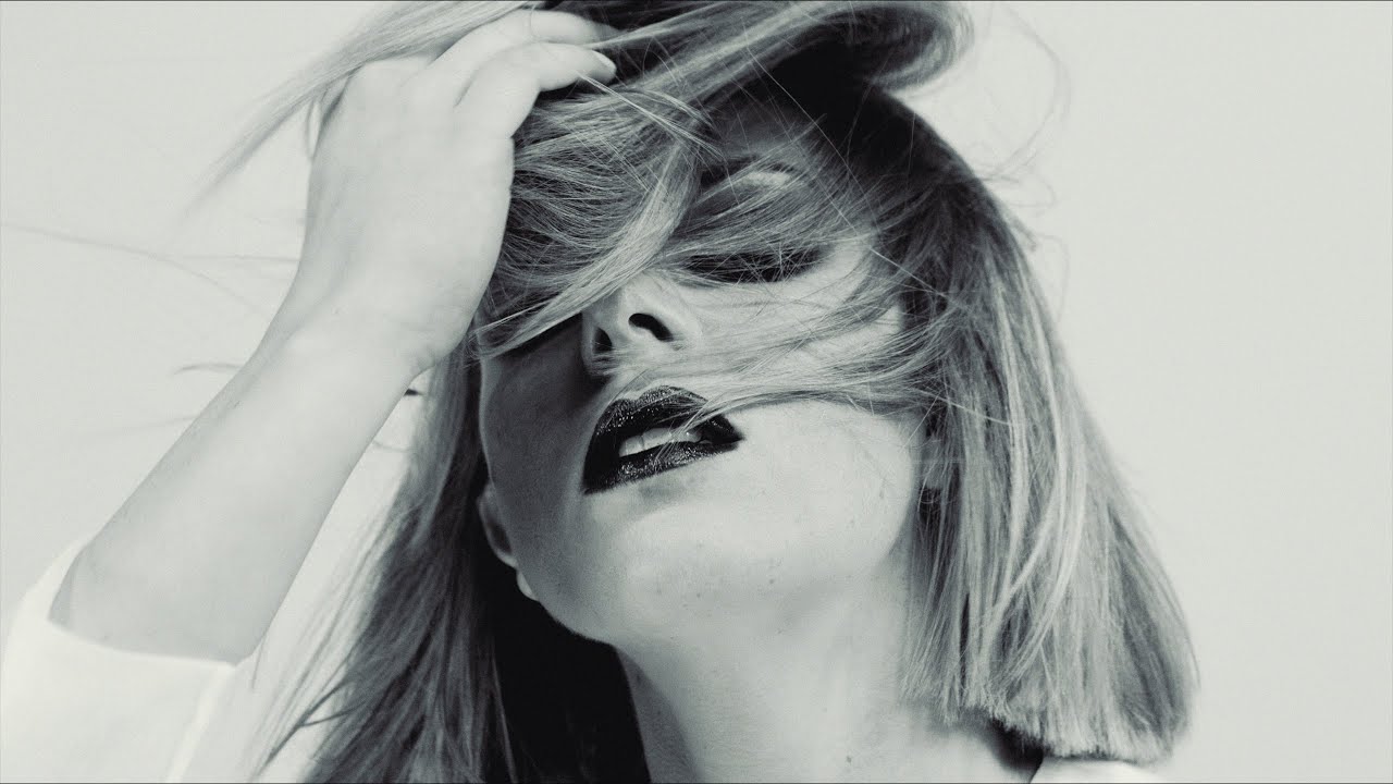 Nabil Nayal × Jennifer Davies: monochrome portrait from the original film.